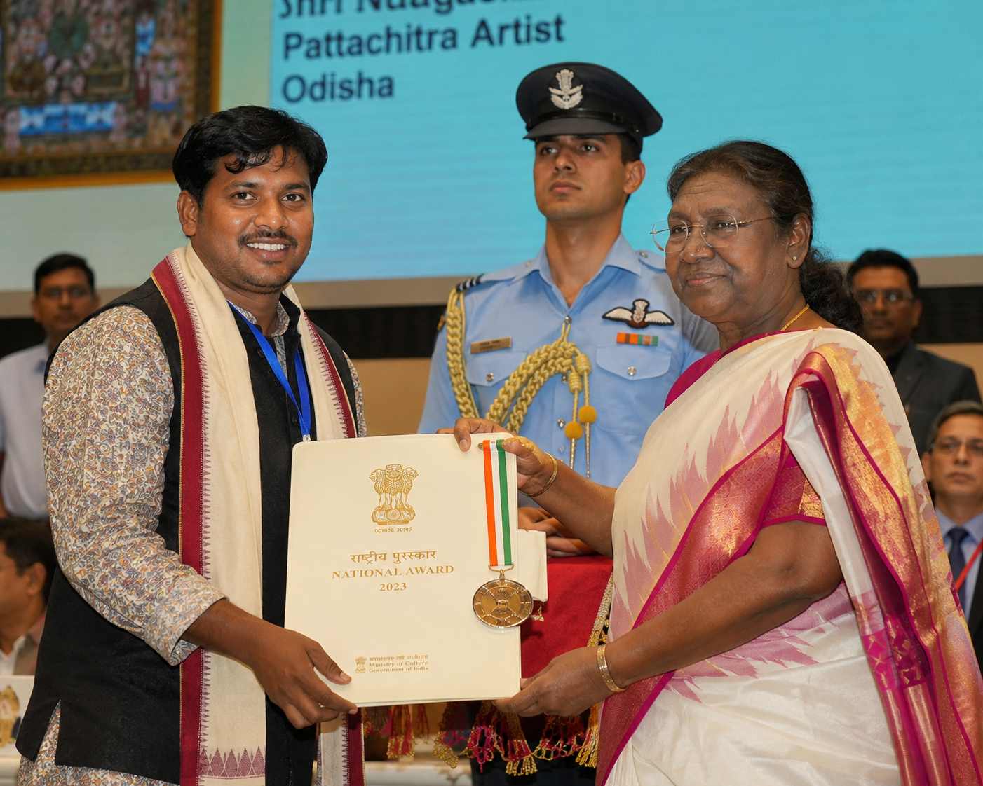 Pattachitra artist receiving a National Award